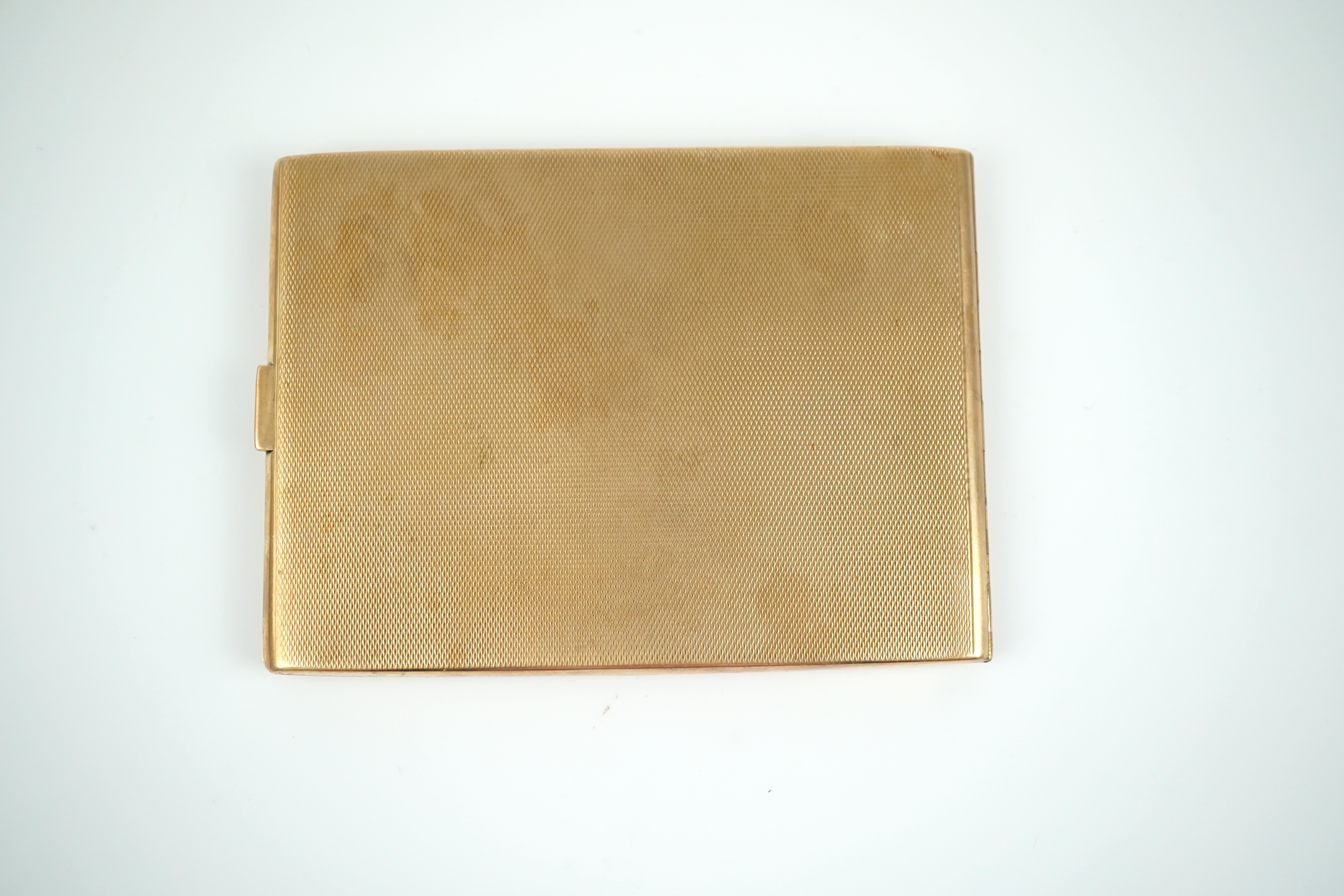 A 9ct gold cigarette case, circa 1929